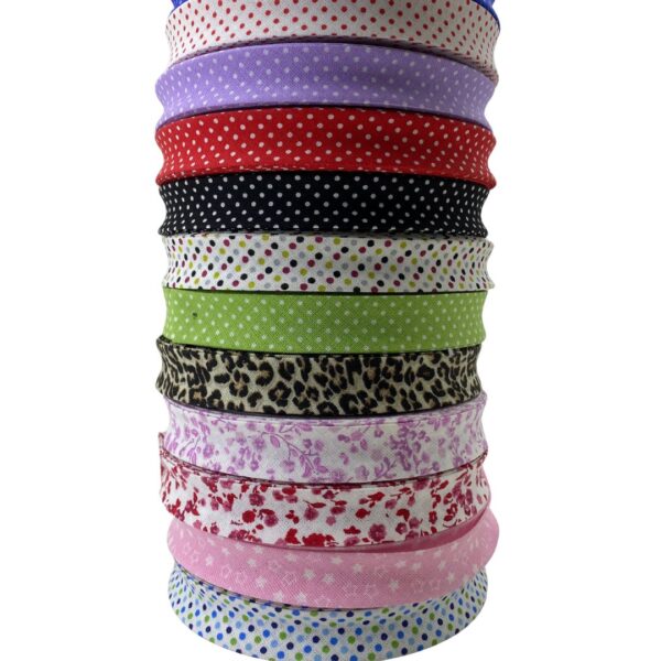 CINTA AL BIES ALGODON ESTAMPADA 20MM POR ROLLO 25MTS